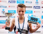 Max Pearson (Tynedale) winner of the 13-14 years BUPA Junior Great Run with his charity number.